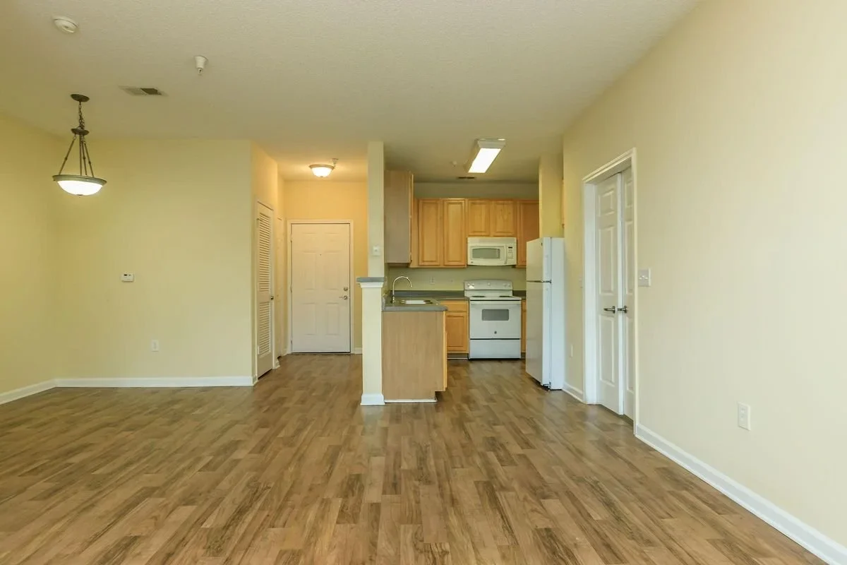 heritage-station-senior-living-entry-and-kitchen.webp